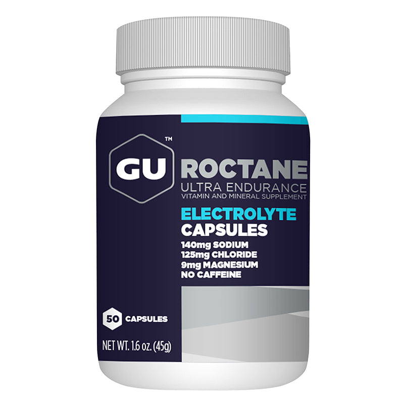 Cápsulas de electrolitos GU Energy Roctane, suplemento para snacks y resistencia, en envase con cápsulas blancas y etiqueta.