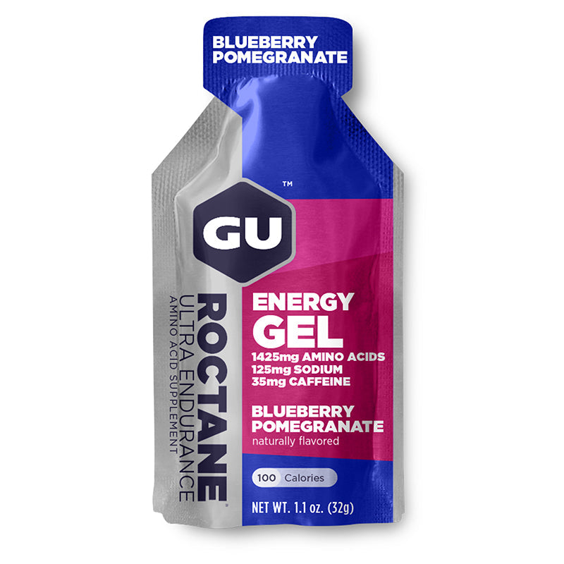 Gel energético GU Roctane con cafeína sabor arándano granada en caja de 12 unidades, ideal para snacks y endurance.