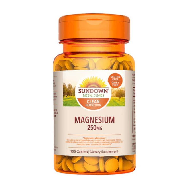 Suplemento de magnesio Sundown Naturals 250 mg en 100 cápsulas, muestra frascos con cápsulas de color blanco y etiqueta.